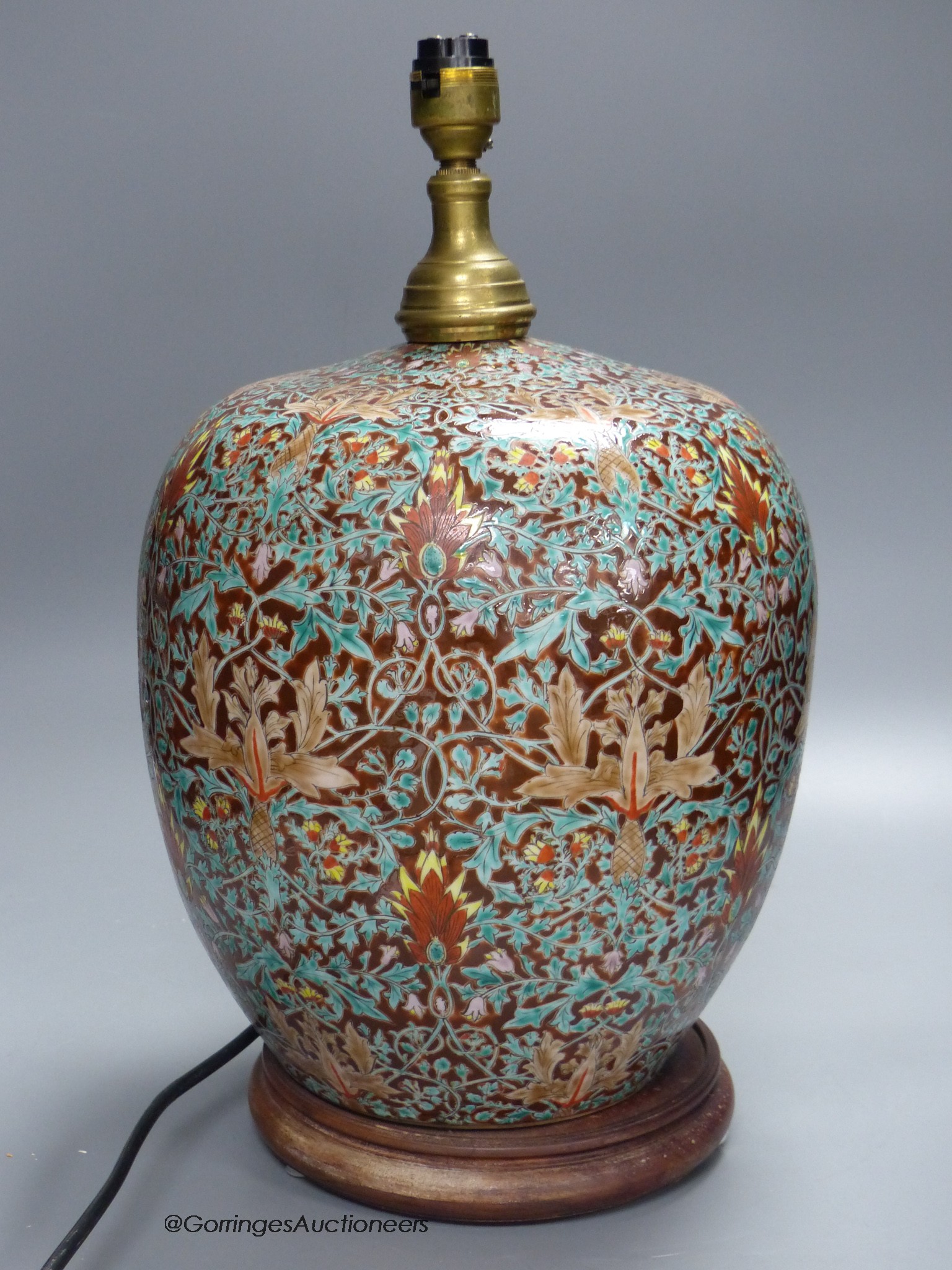 A decorative glazed porcelain lamp base